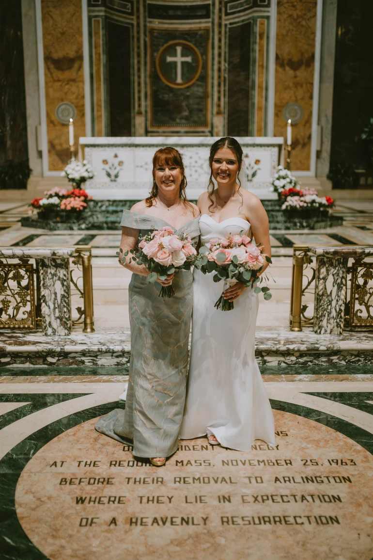 Women holding bouquets