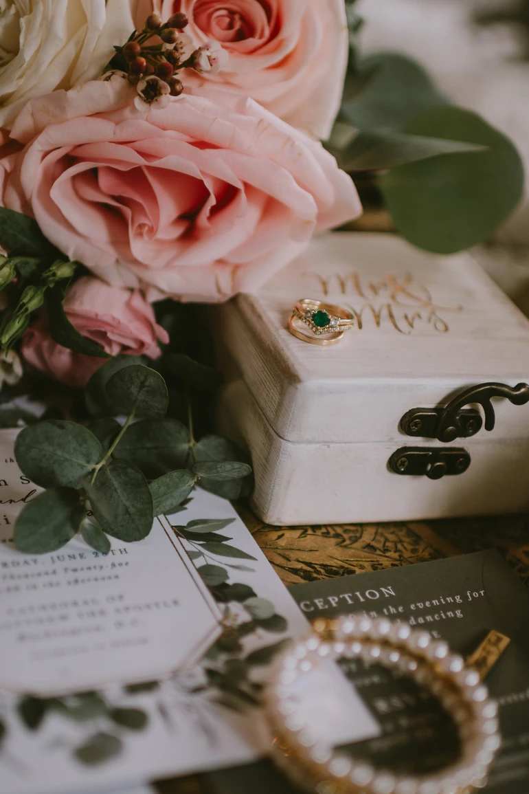 Rings next to pink florals