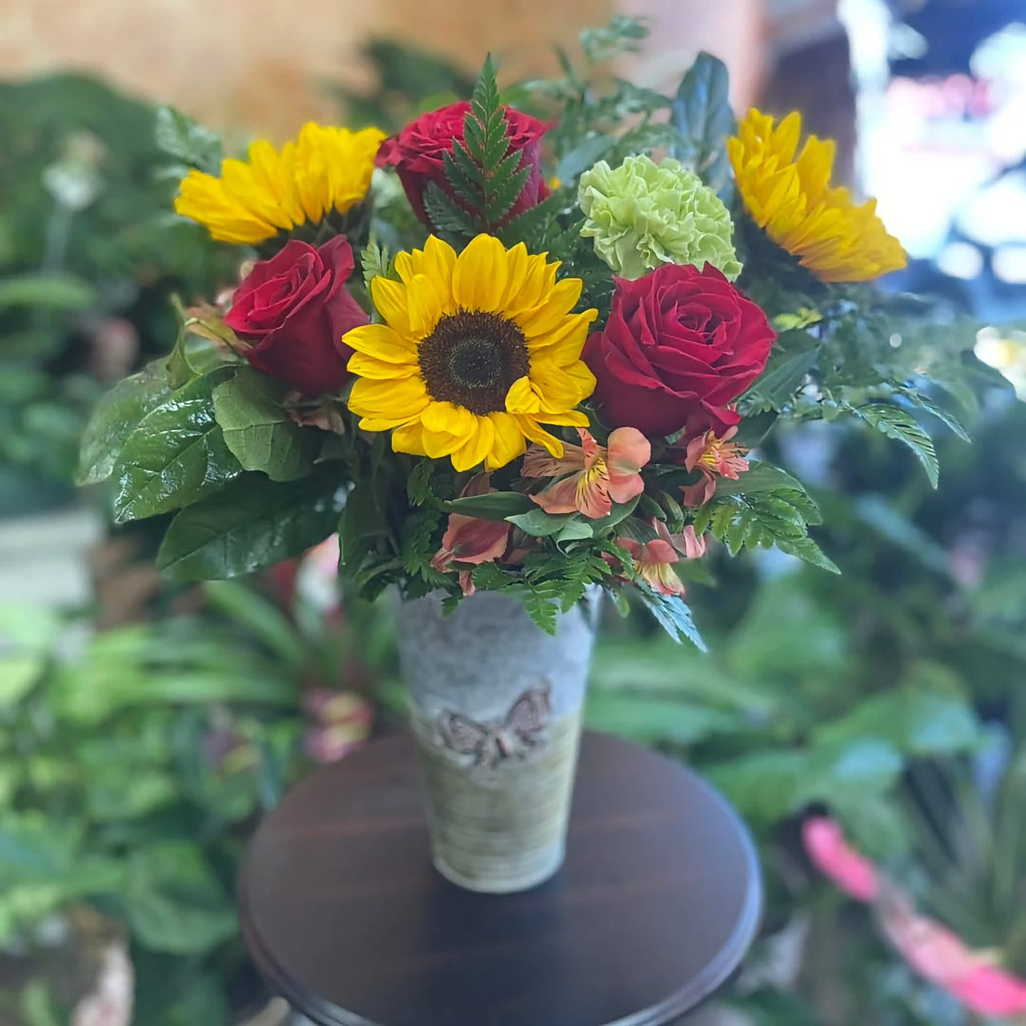 Hope N Bloom custom floral arrangement with sunflowers and red roses