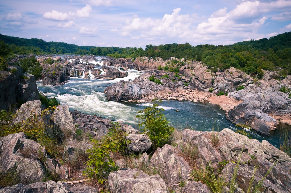 View of waterfalls and rocks in the Potomac River that runs through Great Falls, VA.