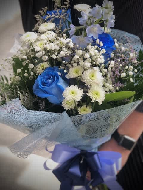 Rogers high school graduation bouquet and lei