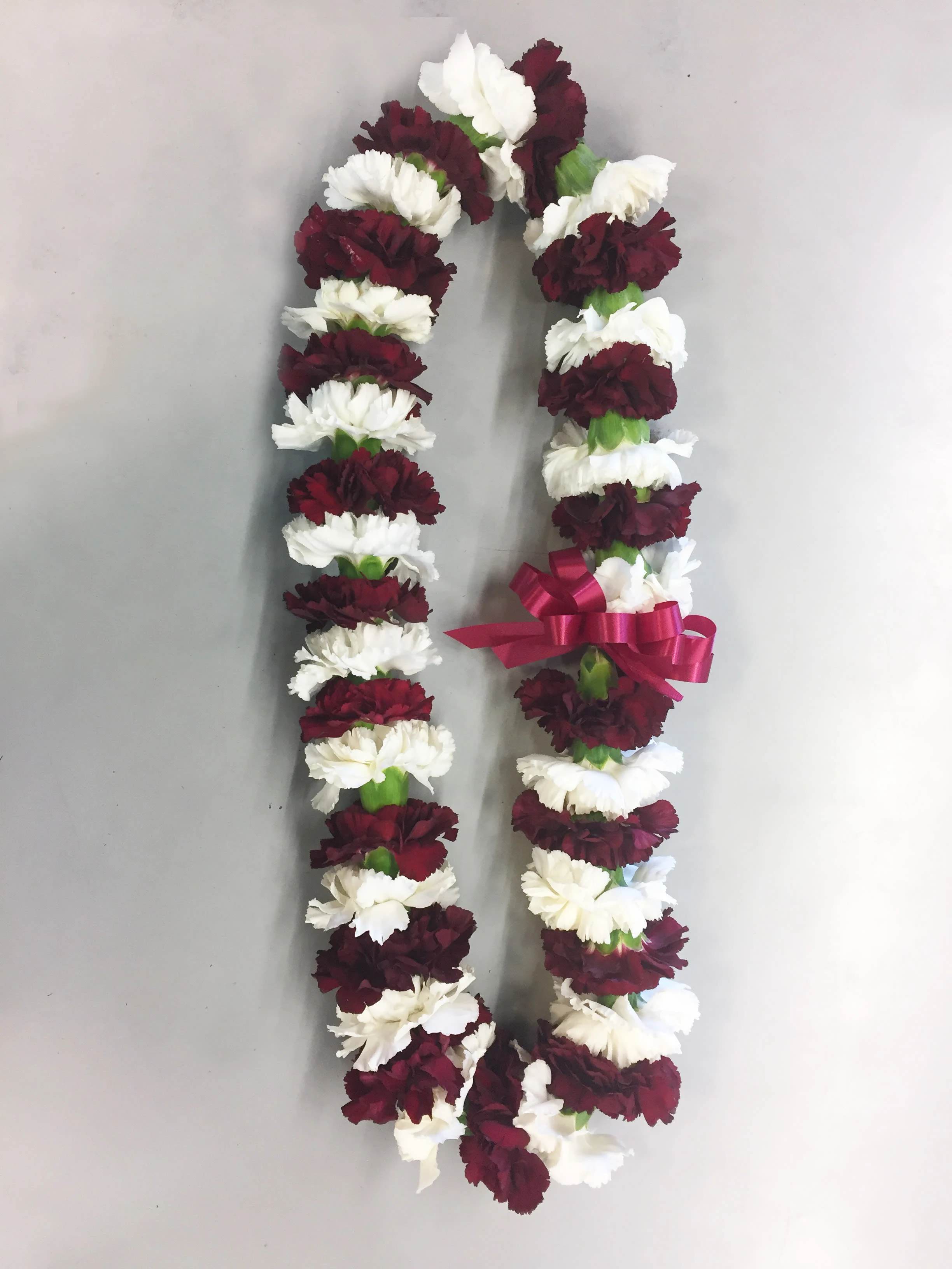 Graduation leis and floral bouquets