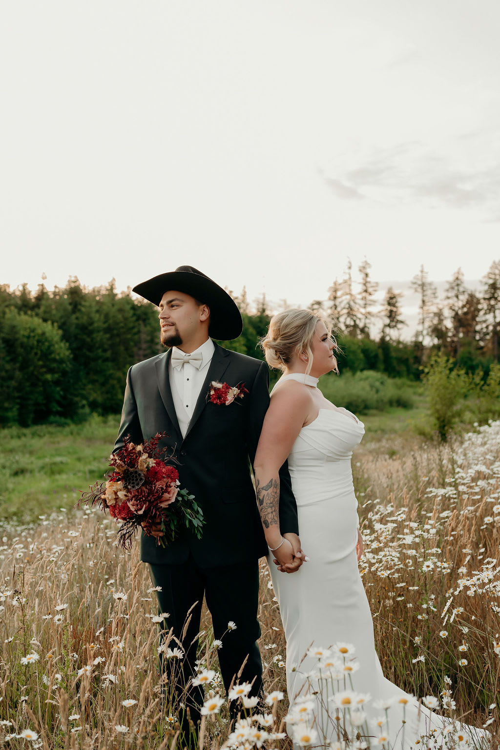 Bride and Groom and their wedding flowers in Olympia, WA. 