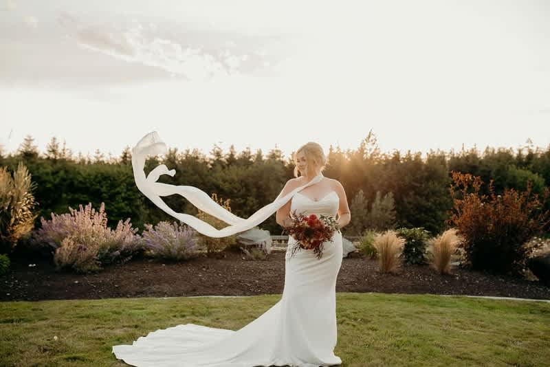 Bride's bridal bouquet at Hillside farms.  The bridal bouquet has roses and dahlias.