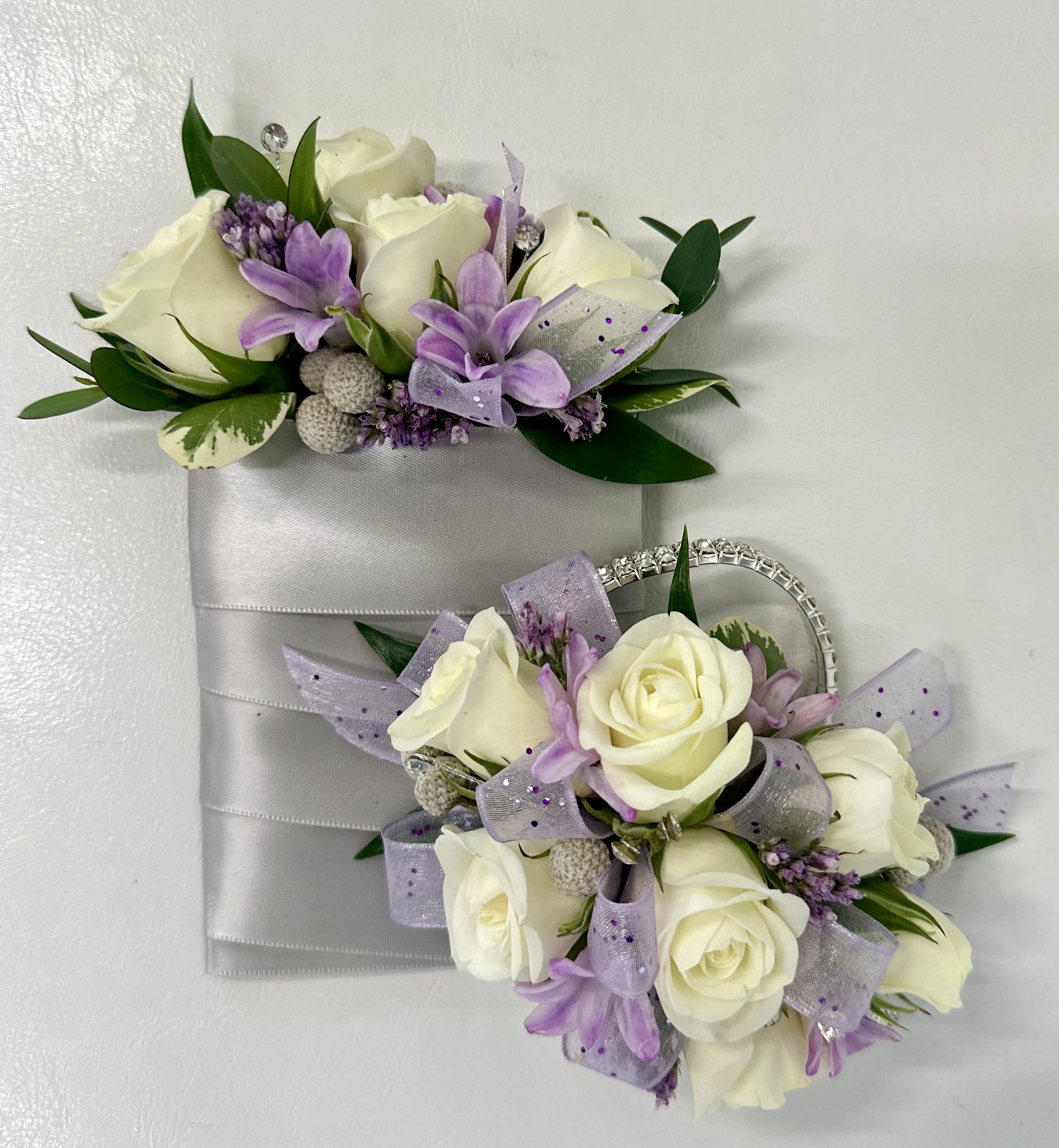 Prom corsage and buttonier by Westford Florist Art by Veny