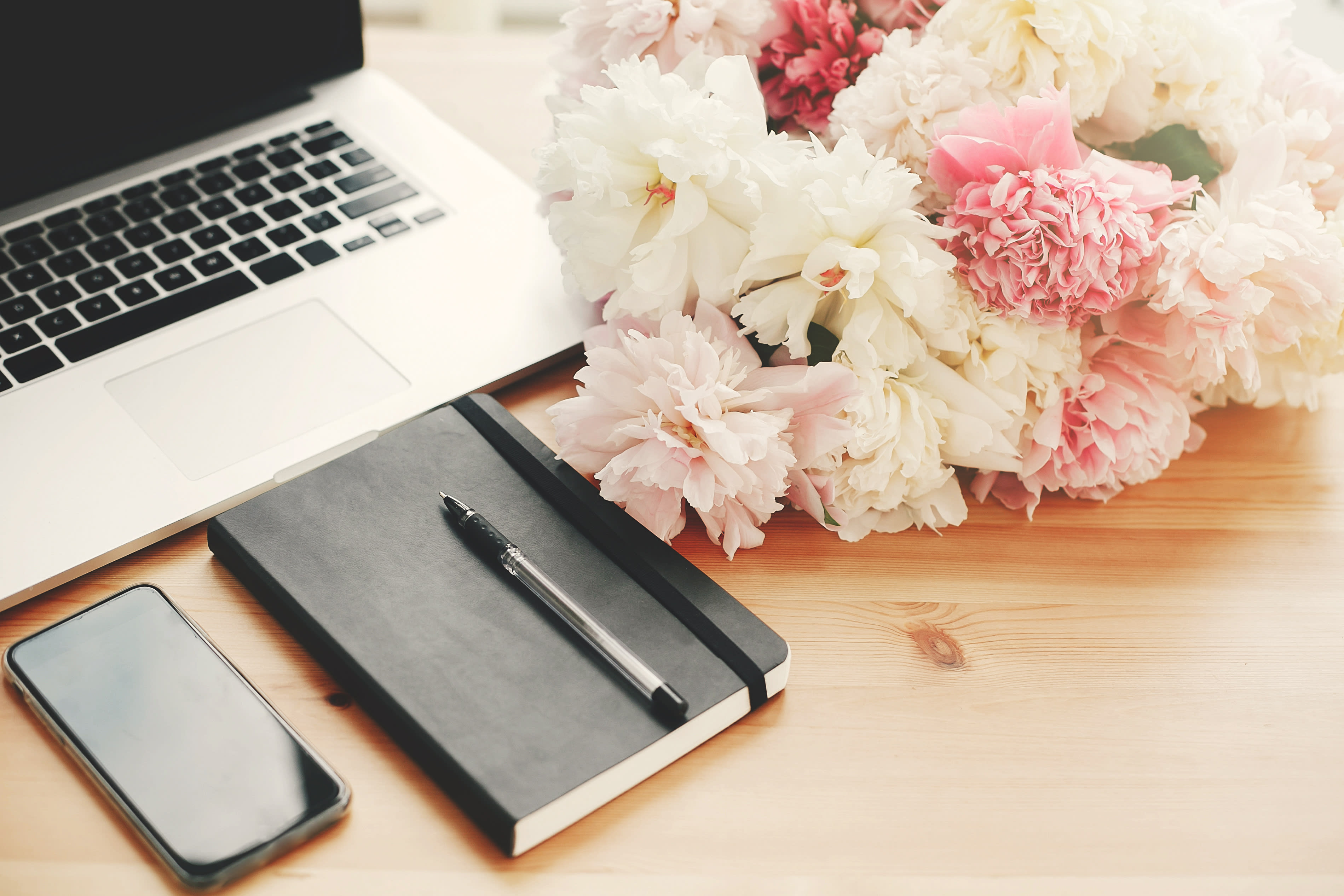 computer desk with flowers