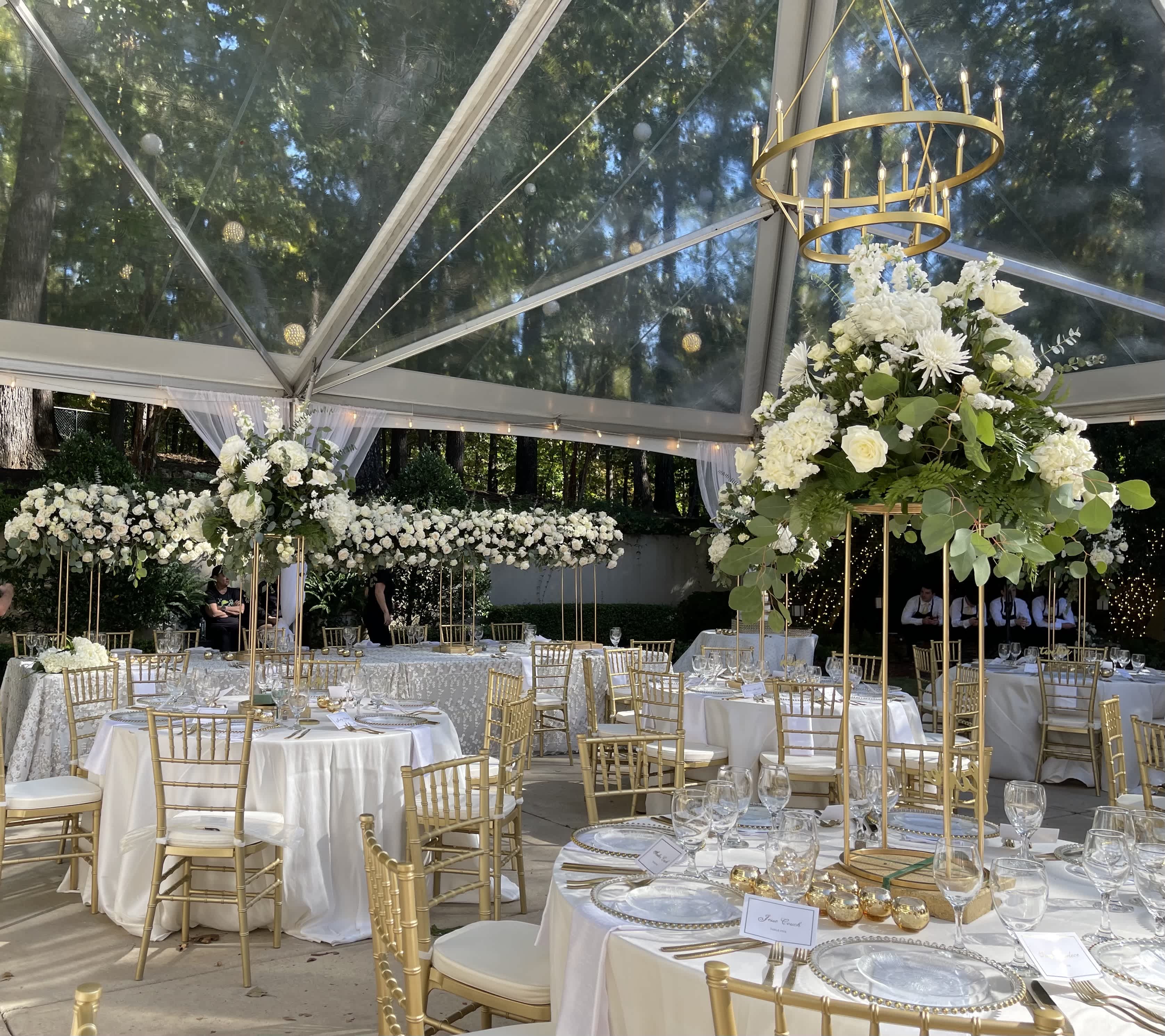 Elegant wedding reception florals designed by Legacy Florals & Gifts