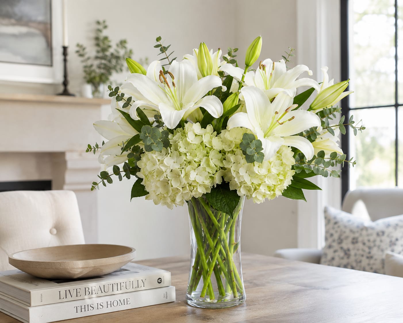White lily sympathy arrangement delivered by Spring Flower Market to Conroe Funeral Directors on North Thompson Street.
