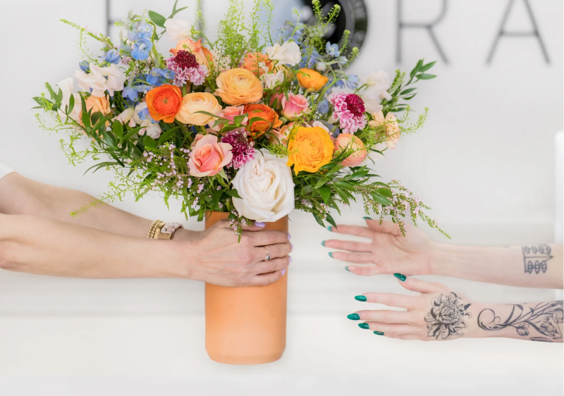 Floral arrangement in decorative packaging