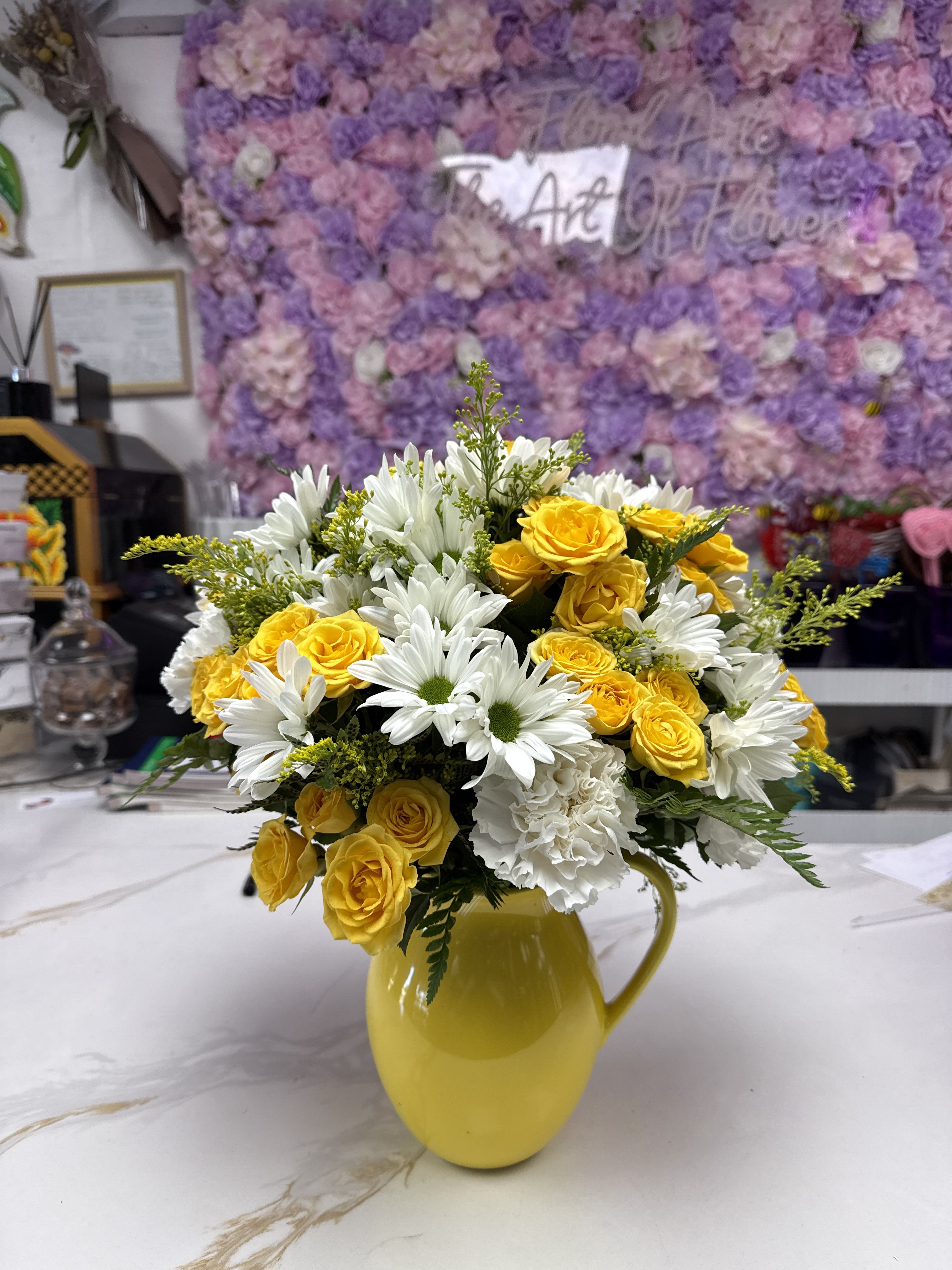 Teleflora's Sunny Day Pitcher of Daisies