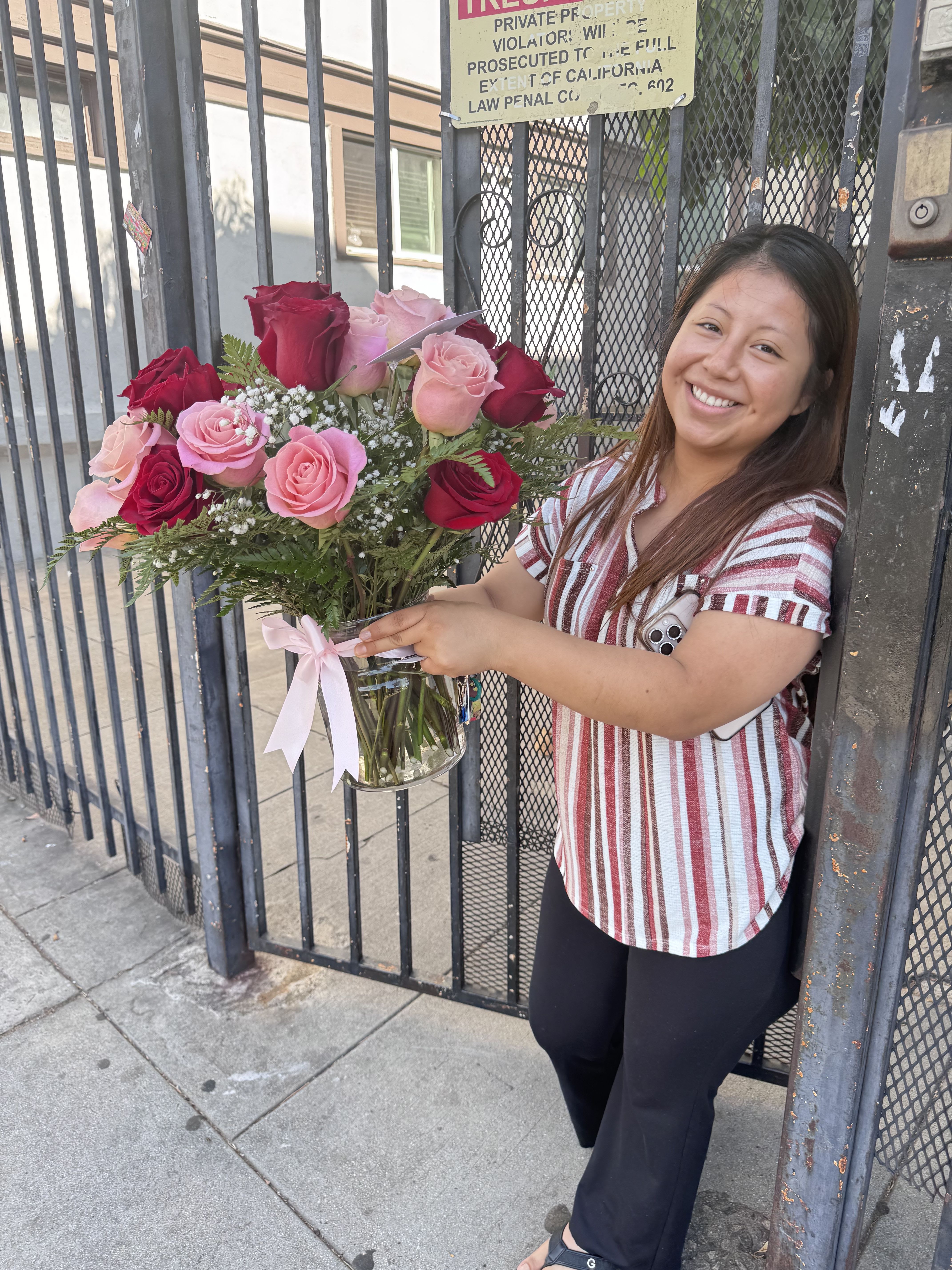 Beautiful red and pink roses in a vase