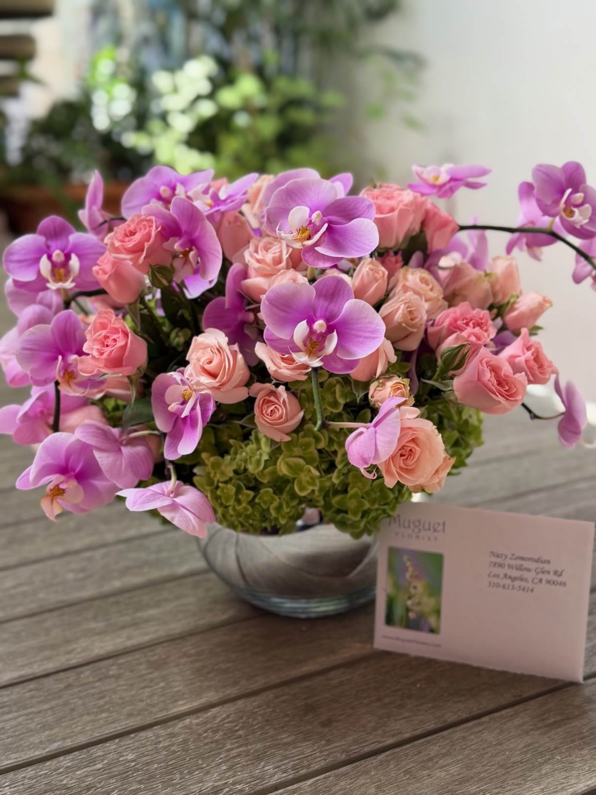 Modern Elegance: Phalaenopsis Orchids, Spray Roses, and Hydrangeas in Glass Bowl Arrangement
