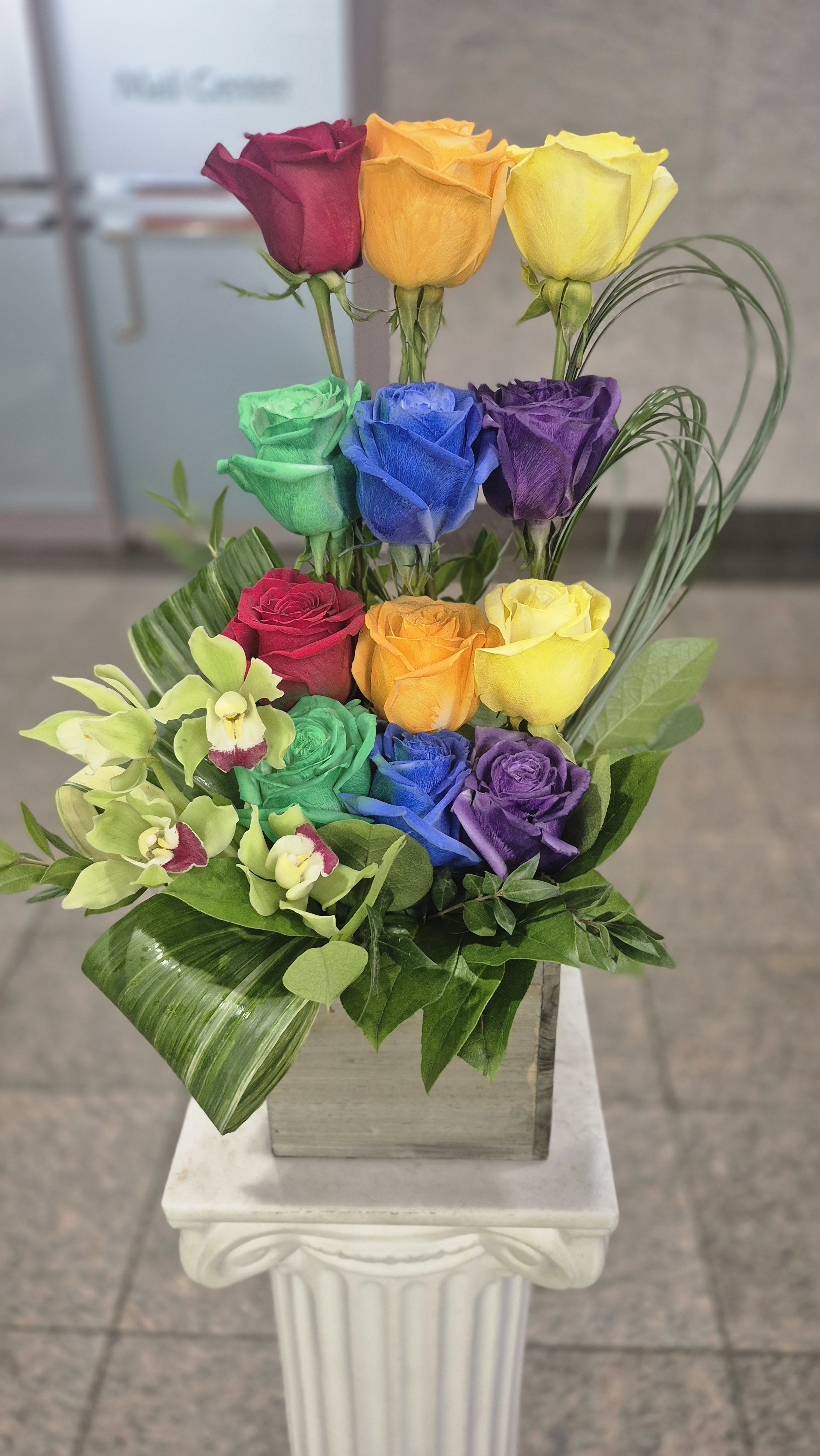 Modern Rainbow Dozen Roses