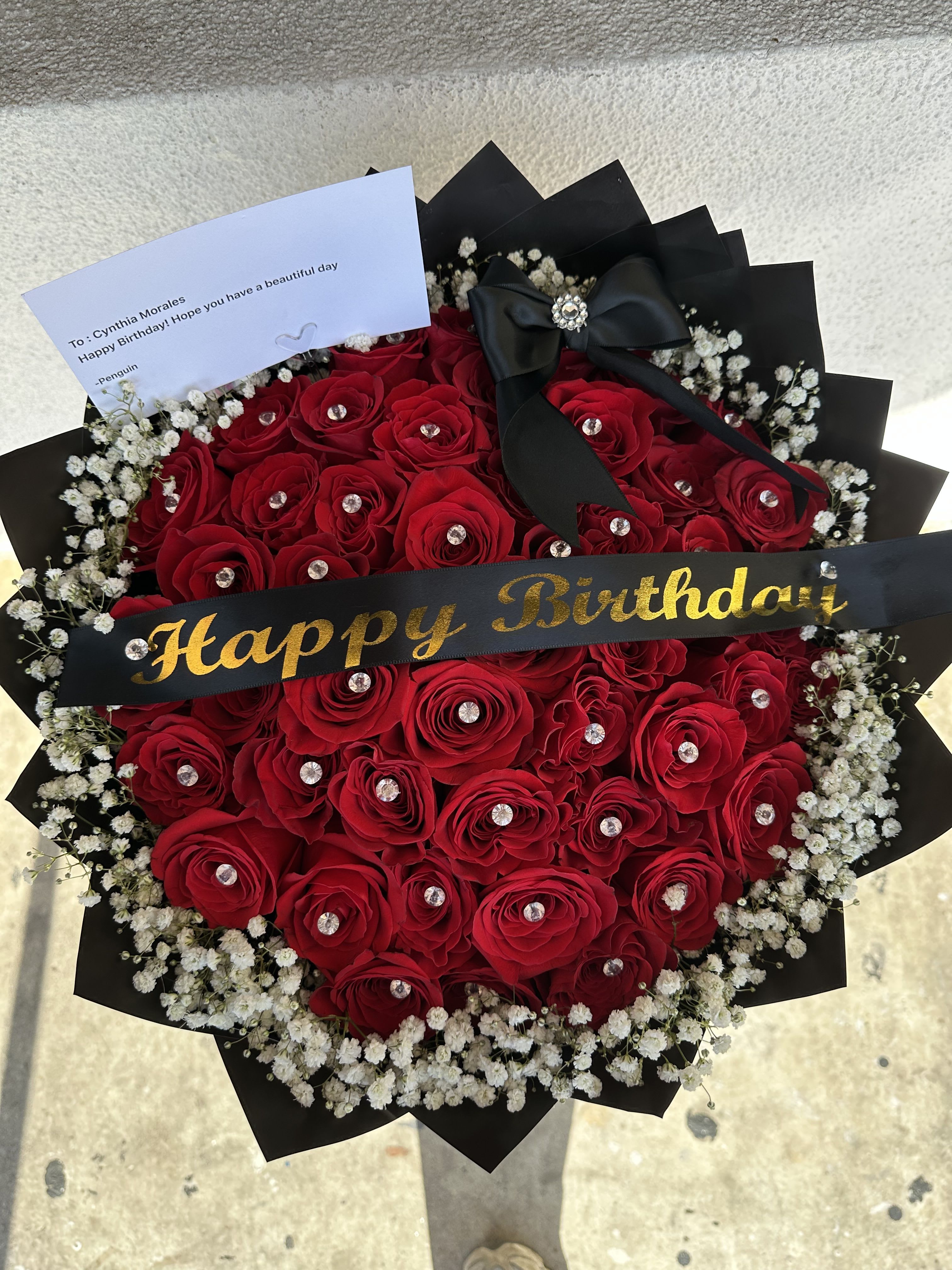 Long stem Ecuadorian roses with babies breath rim 