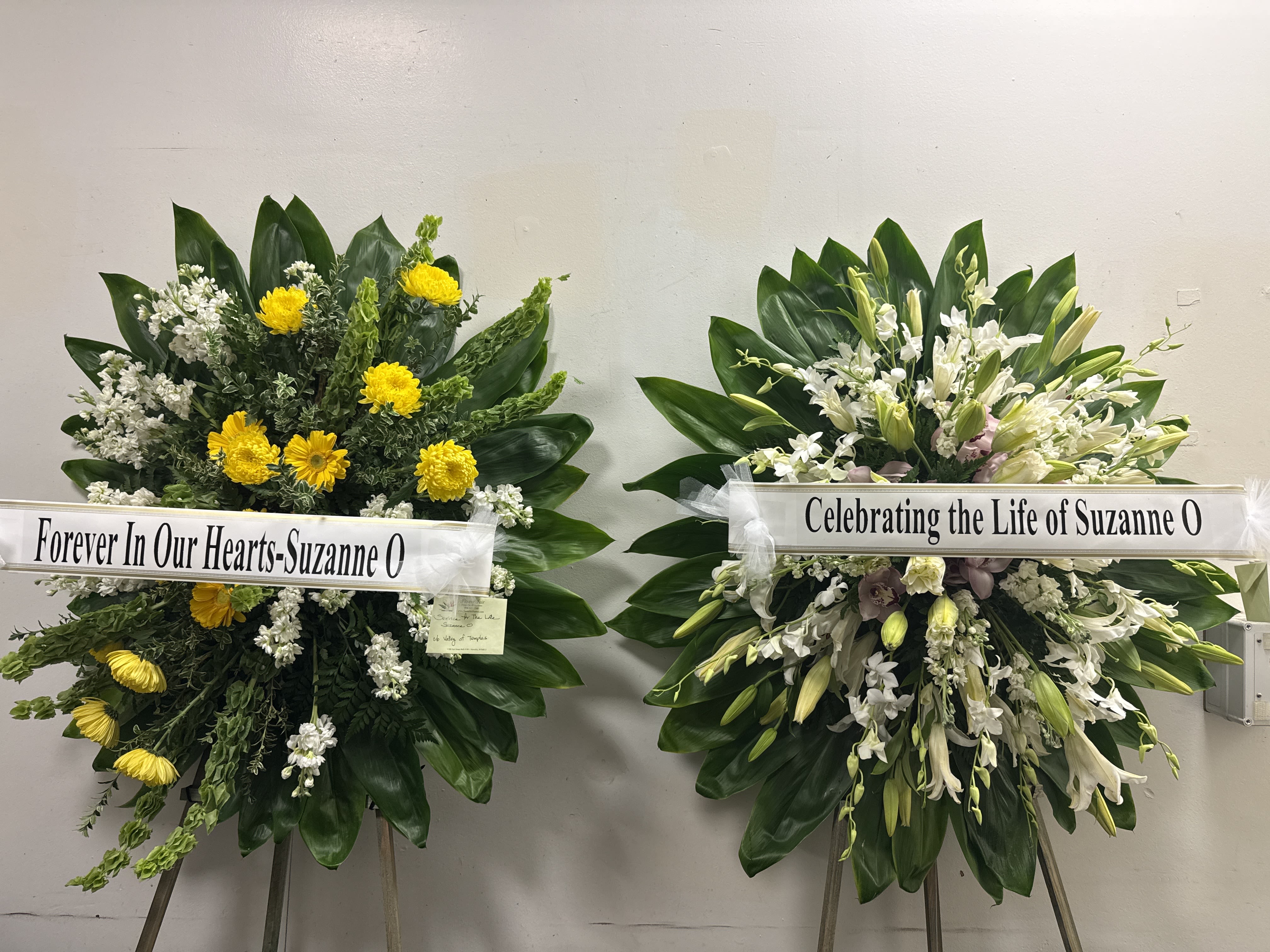 Casket arrangement of lively colorful mix blooms