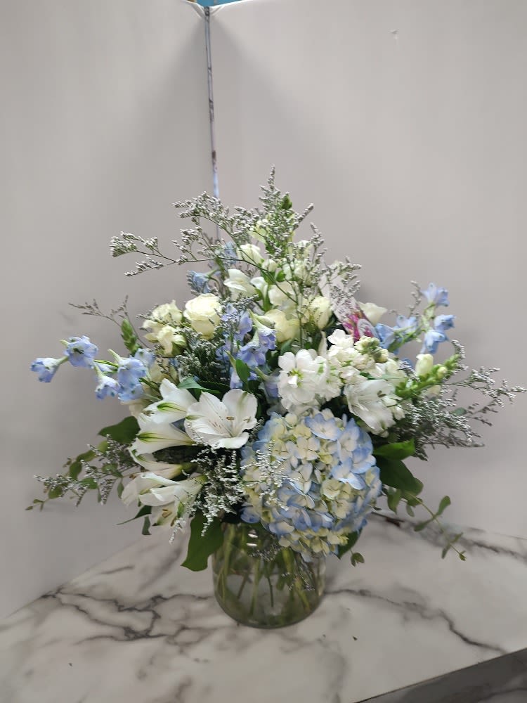 “Blue Skies & Quiet Promises”  by Art and Flowers