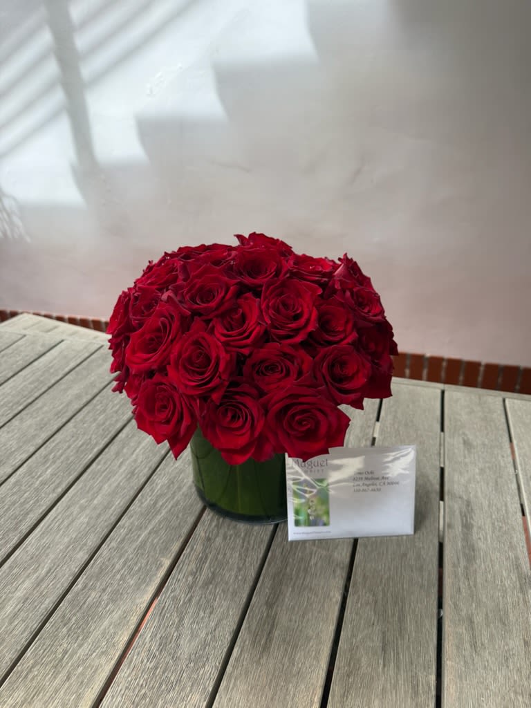 Center of Love: A Stunning Arrangement of Three Dozen Elegant Roses