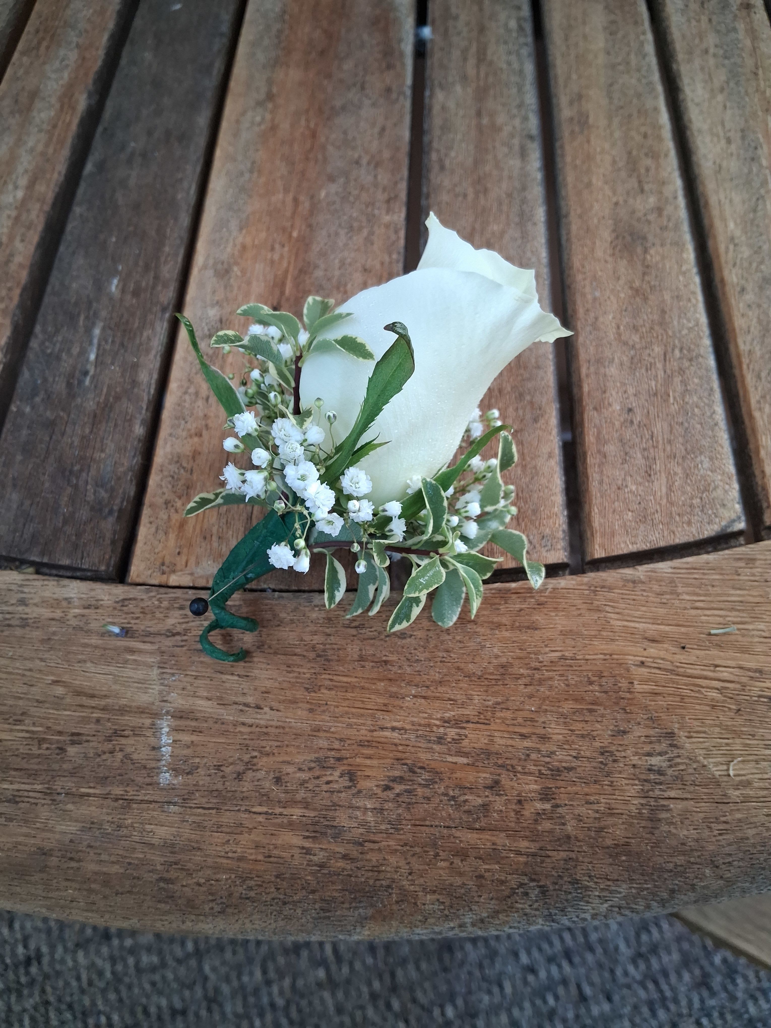 Boutonniere With White Rose and Green Hypericum