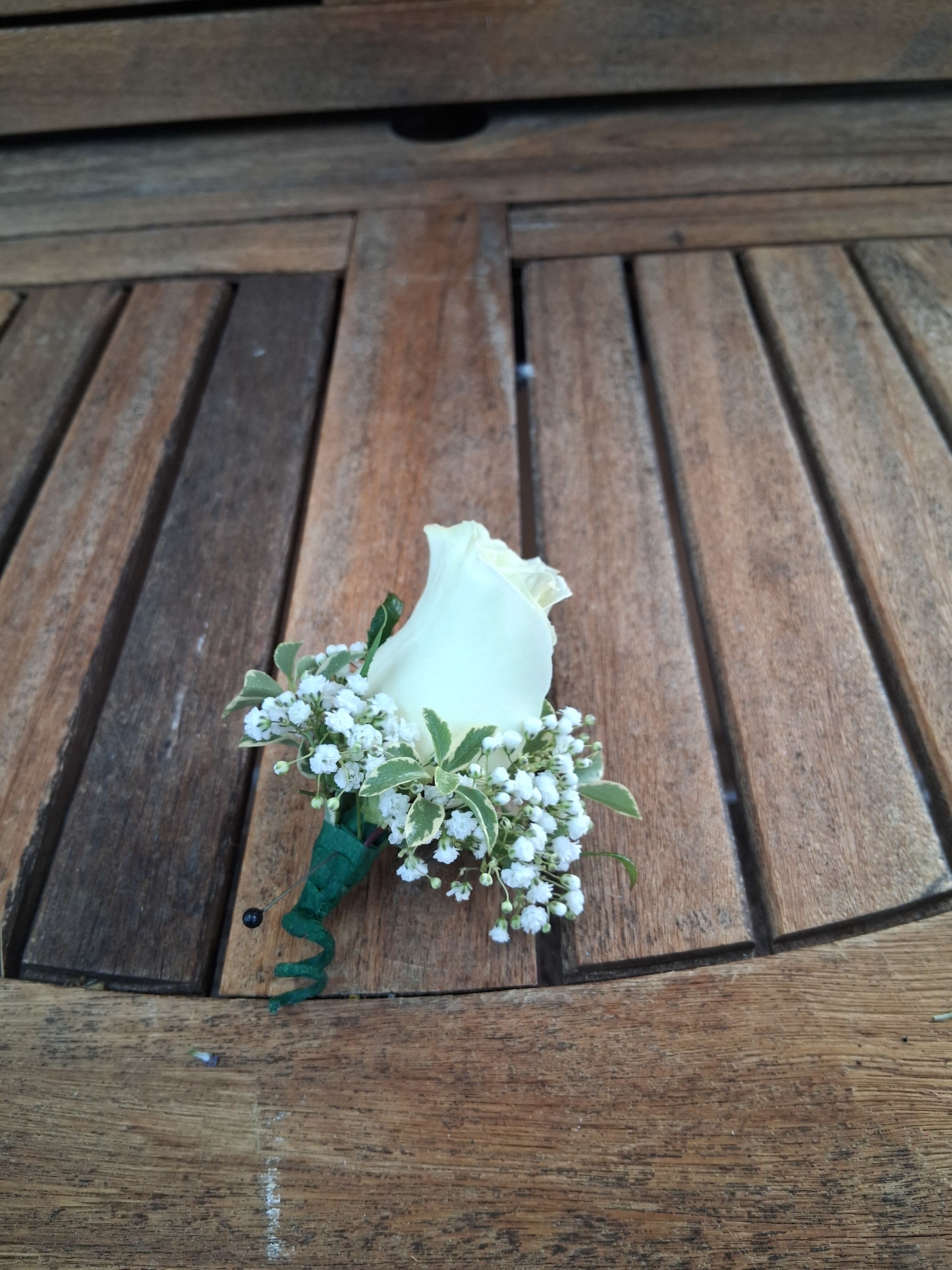 Boutonniere With White Rose and Green Hypericum