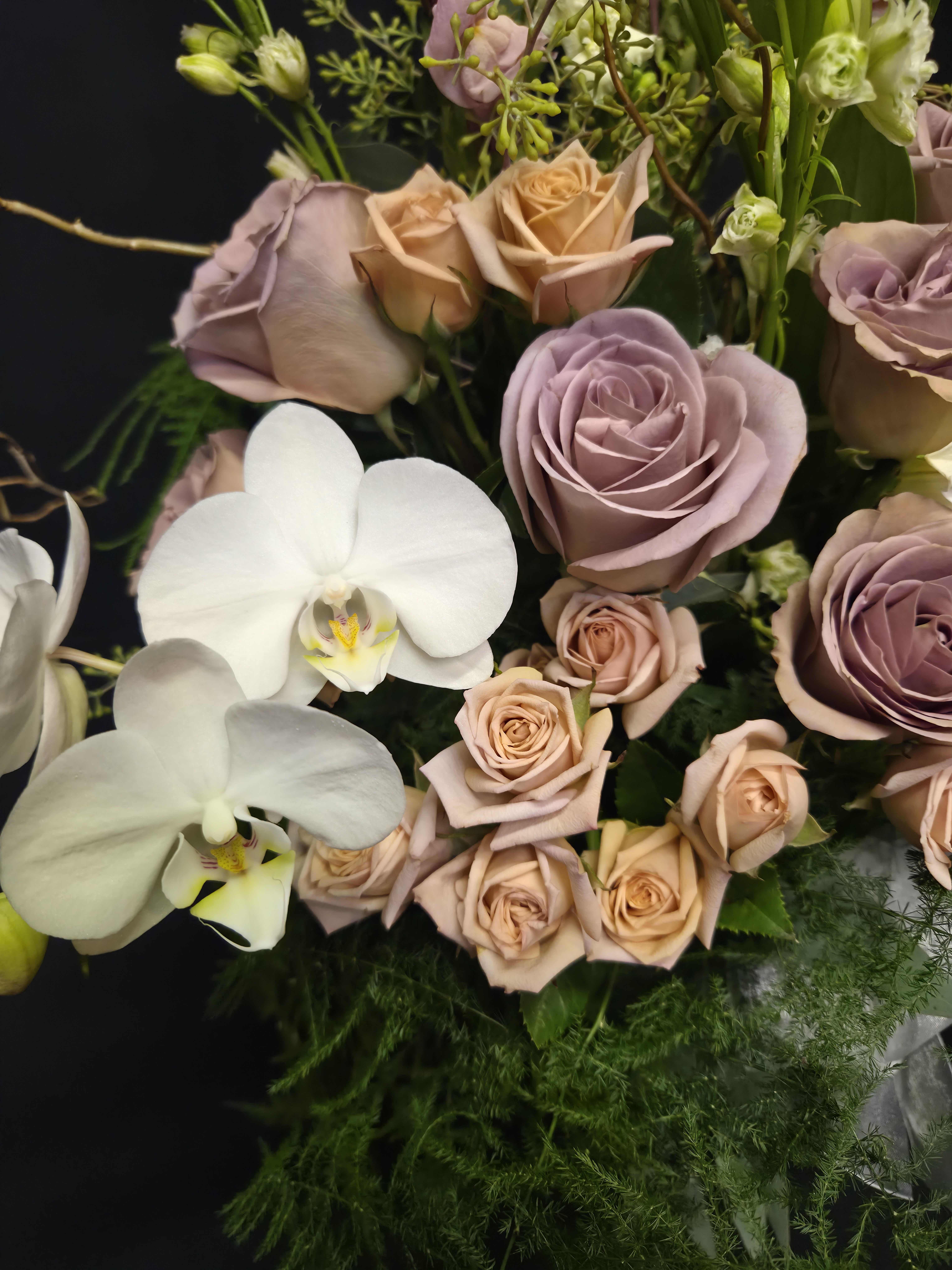 Pure white bouquet with roses and willow