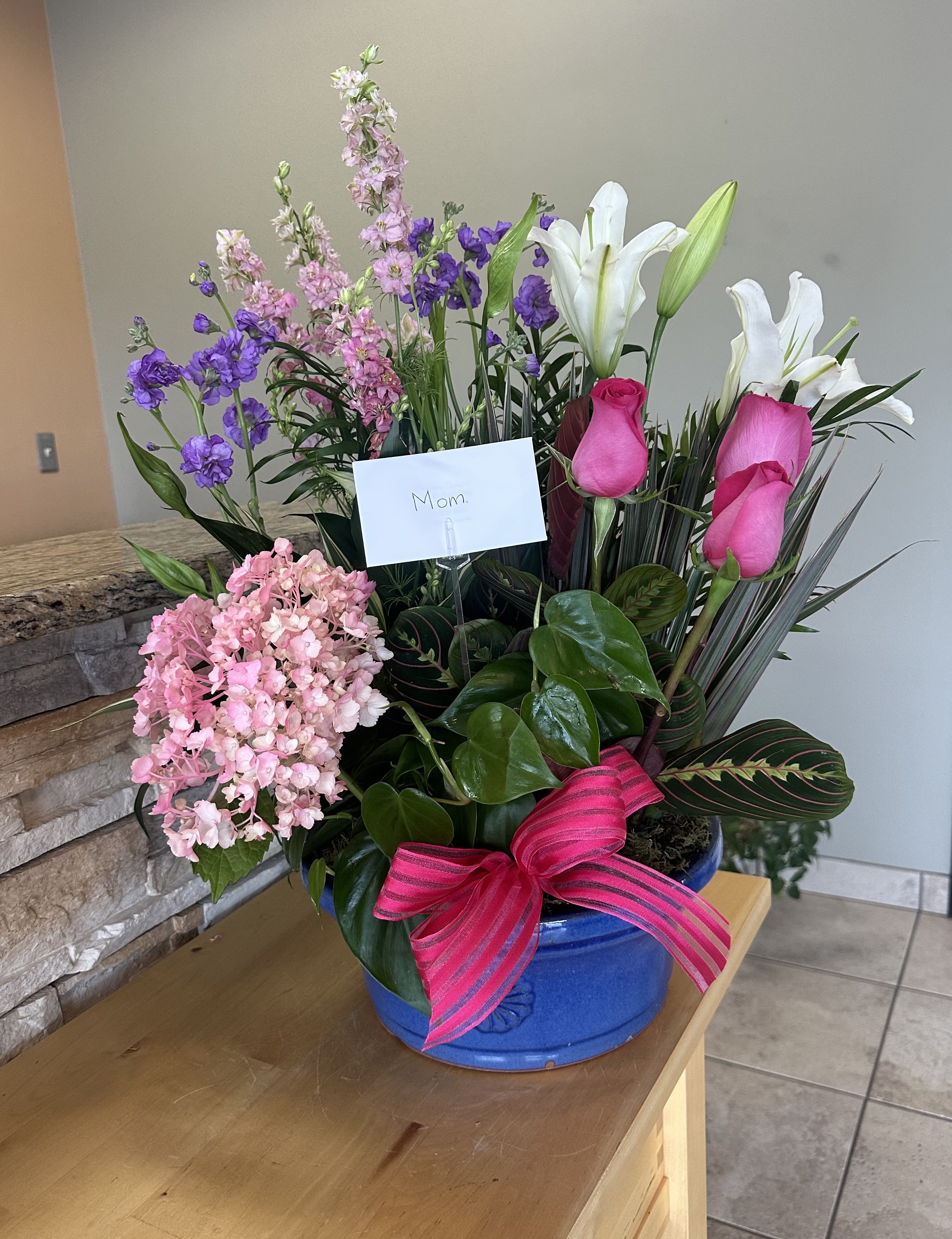 Luxurious Dish Garden with added flowers.
