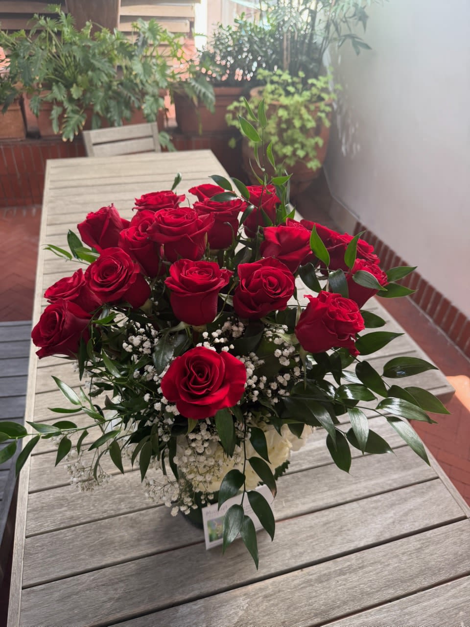 Crimson Elegance: Tall Red Rose Arrangement