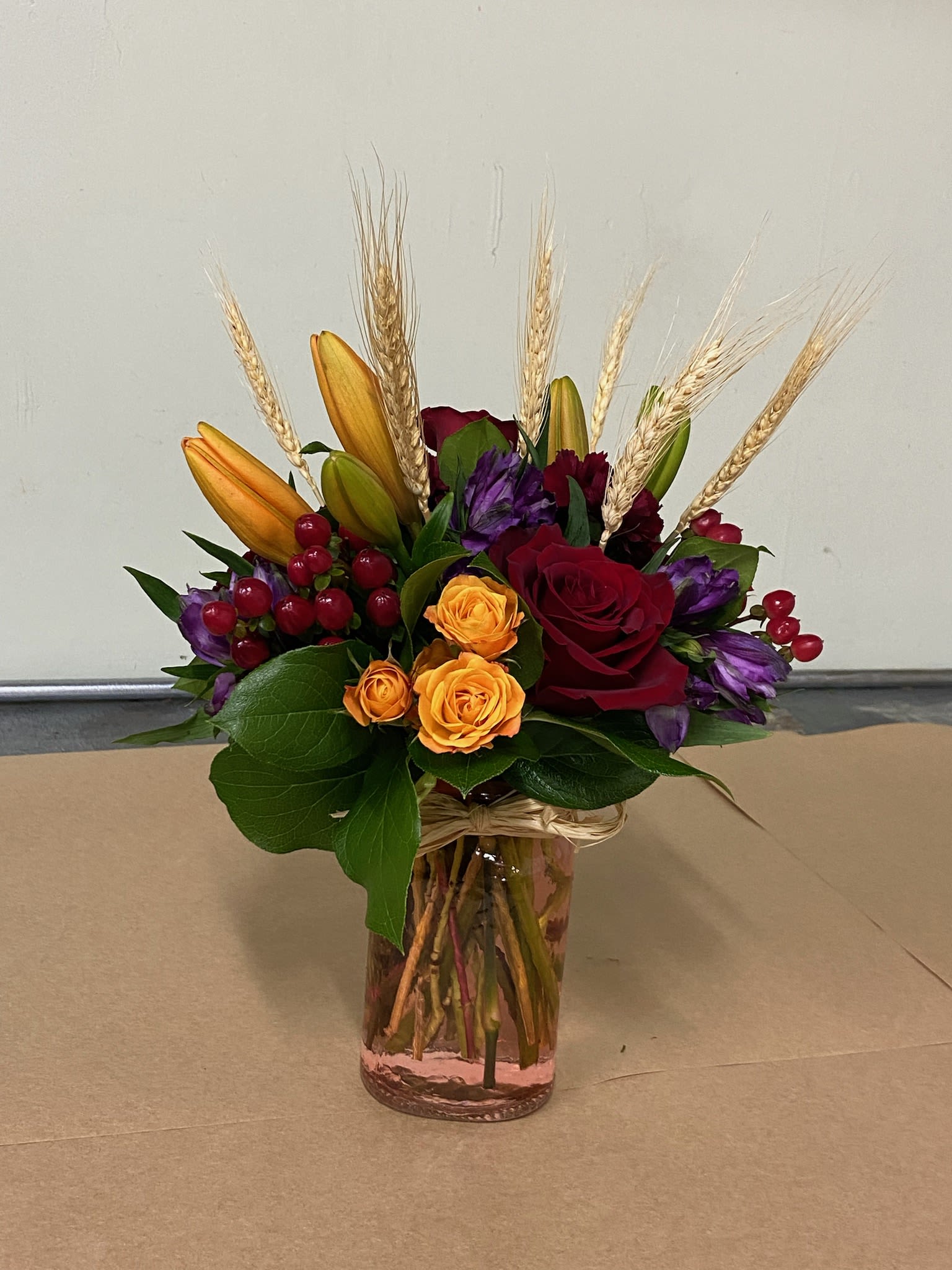 Autumn Harvest Mason Jar Arrangement – Red Roses, Peach Spray Roses & Dried Wheat Accent