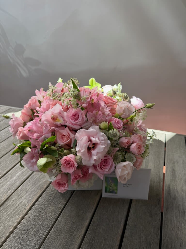 Lady in Pink: A Graceful and Delicate Floral Arrangement