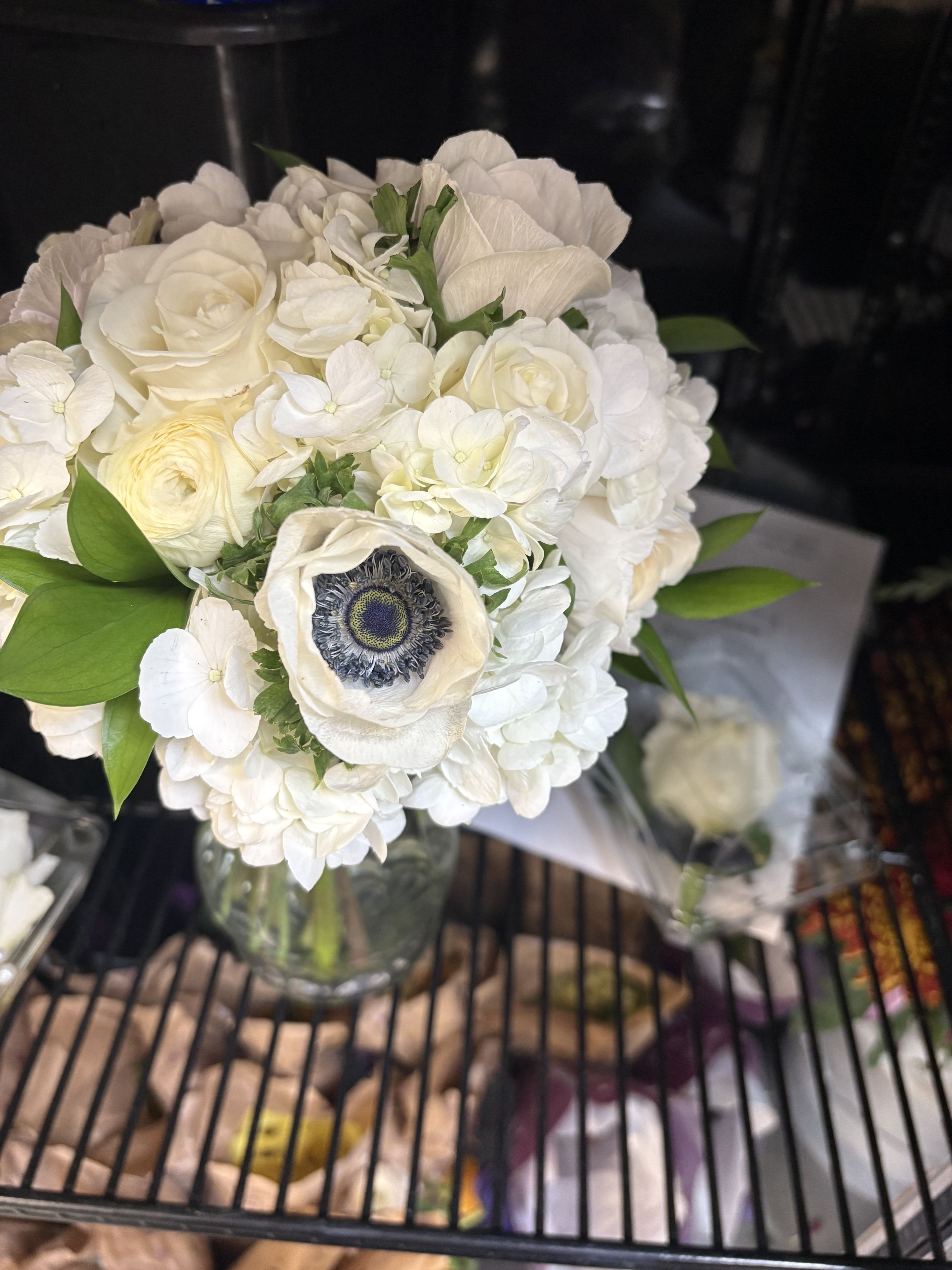Hand tied bouquet white and blue with boutonnière