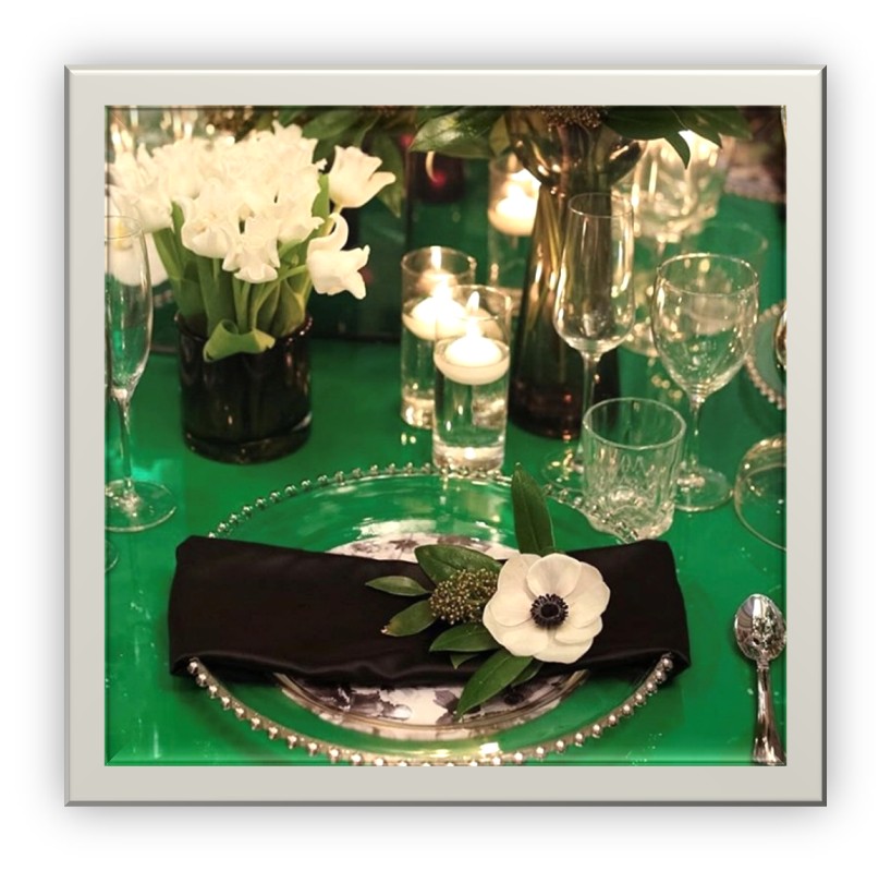 Green table with white arrangements