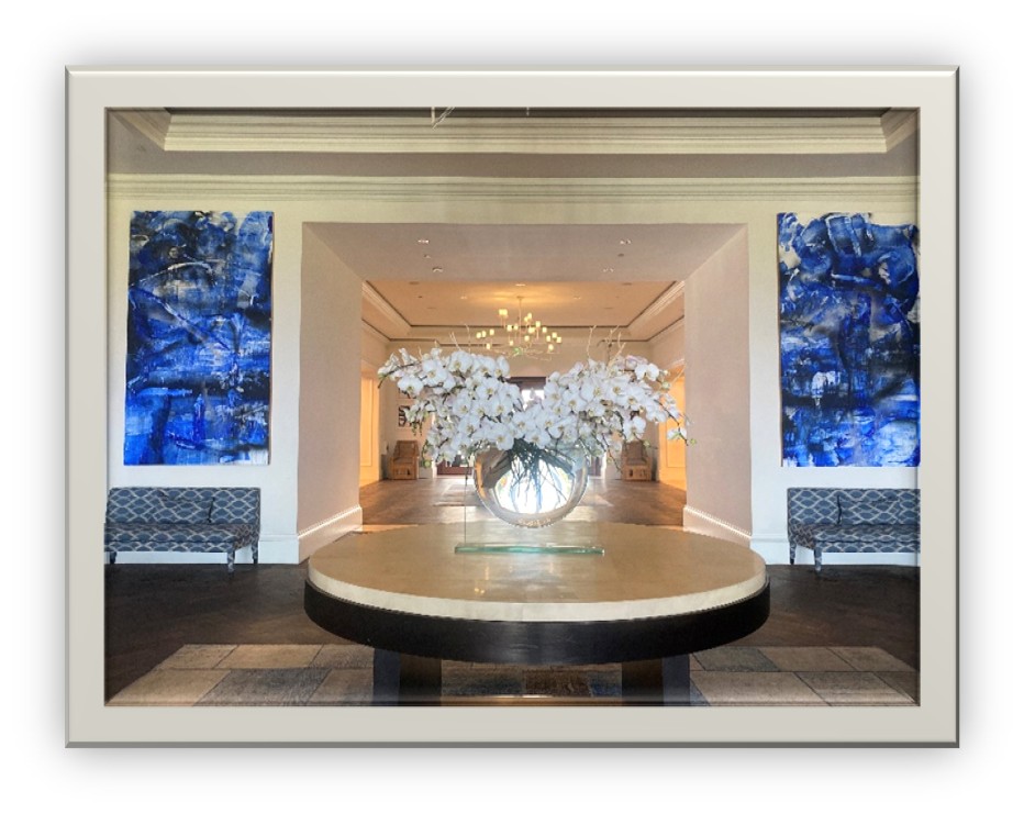 Hotel lobby white centerpiece in a glass bowl