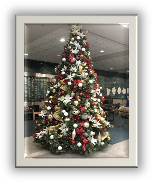 Gold and red christmas tree in hospital lobby