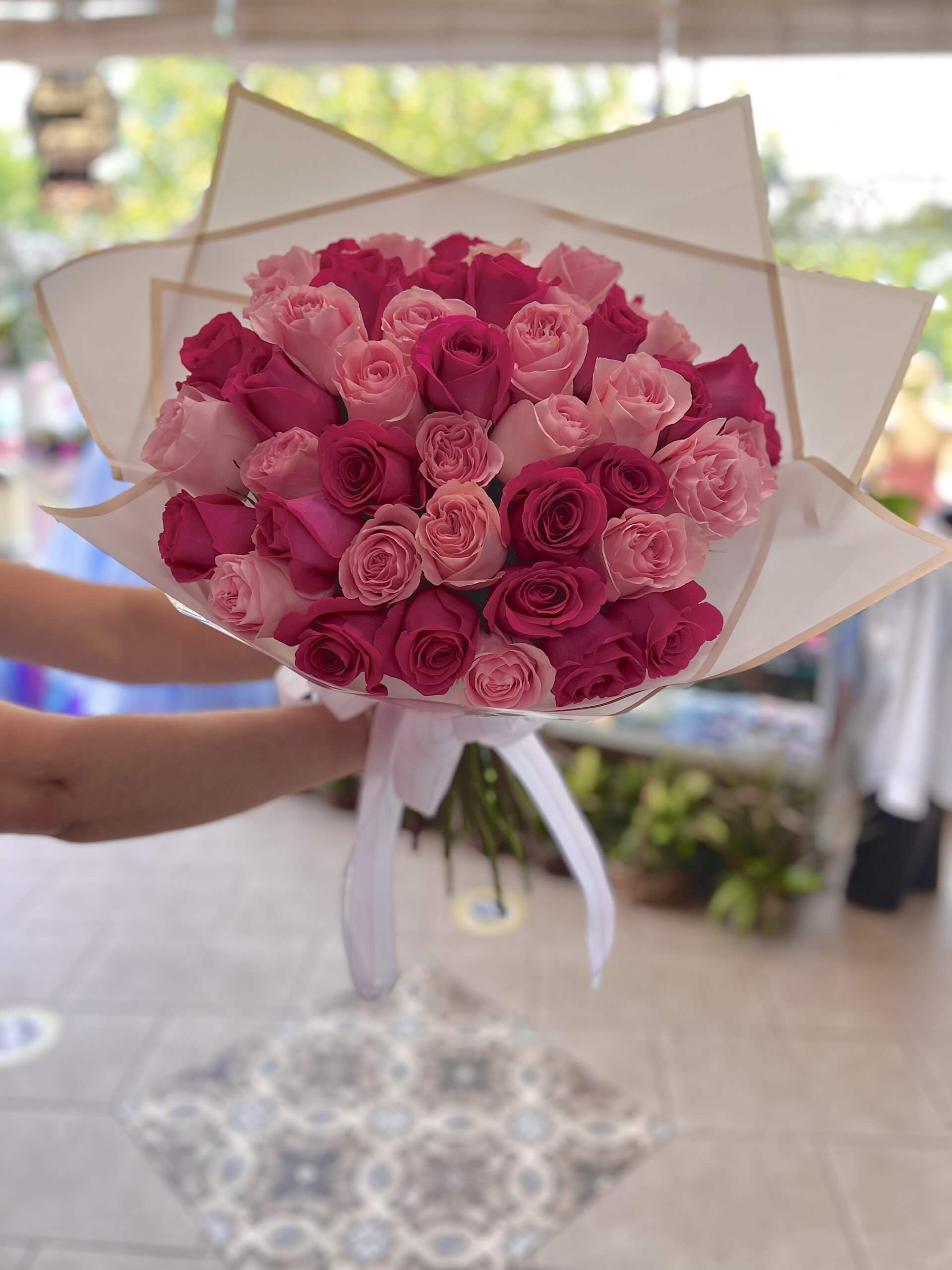 Bride holding elegant bouquet