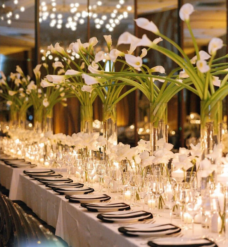 Floral centerpieces on long table