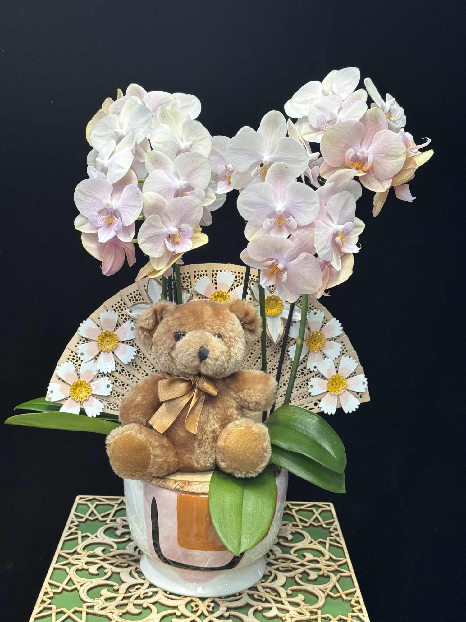 Soft pink orchid arrangement with teddy bear by Ultimate Floral Designs – new baby gift.