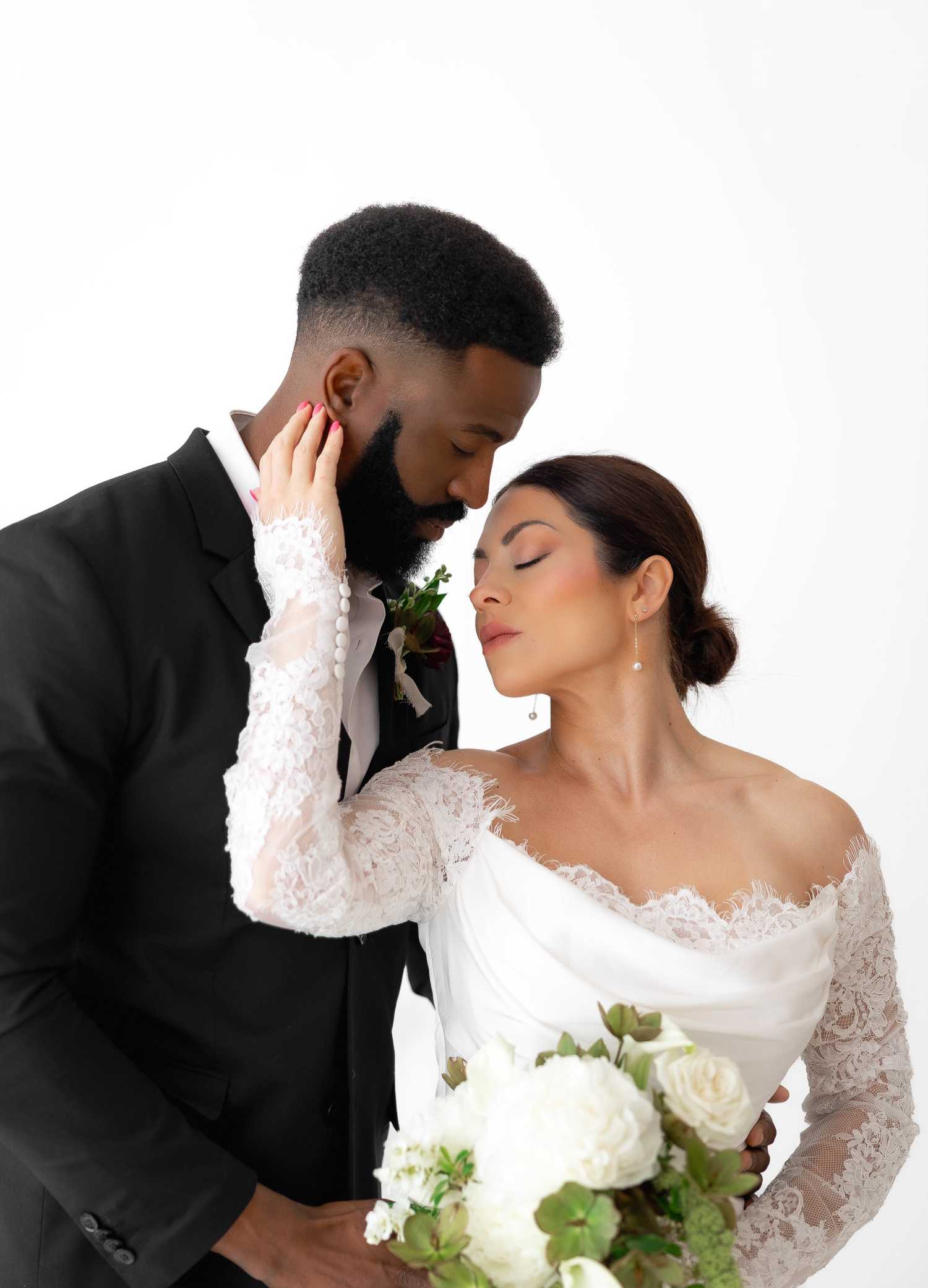 Bride and groom with bouquet