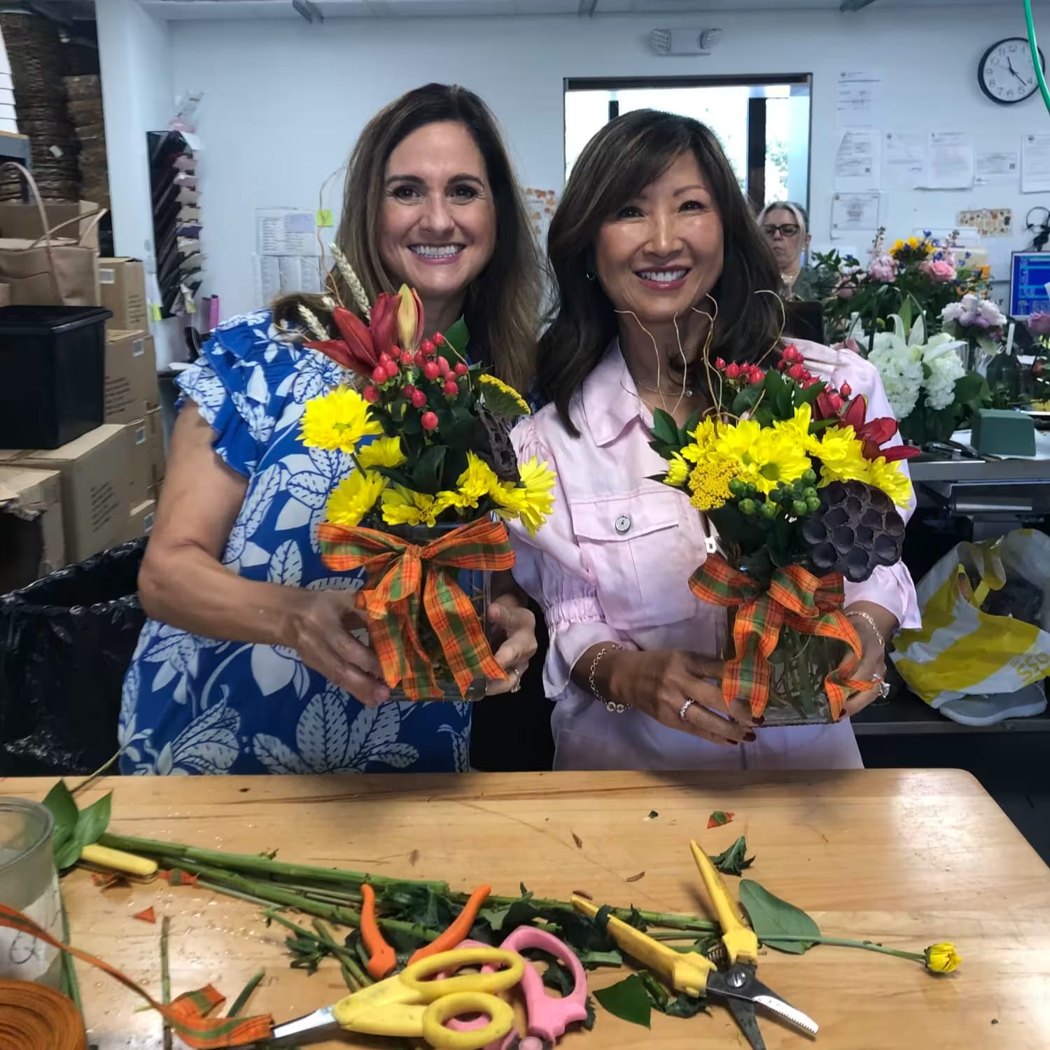 Pair with vase arrangements