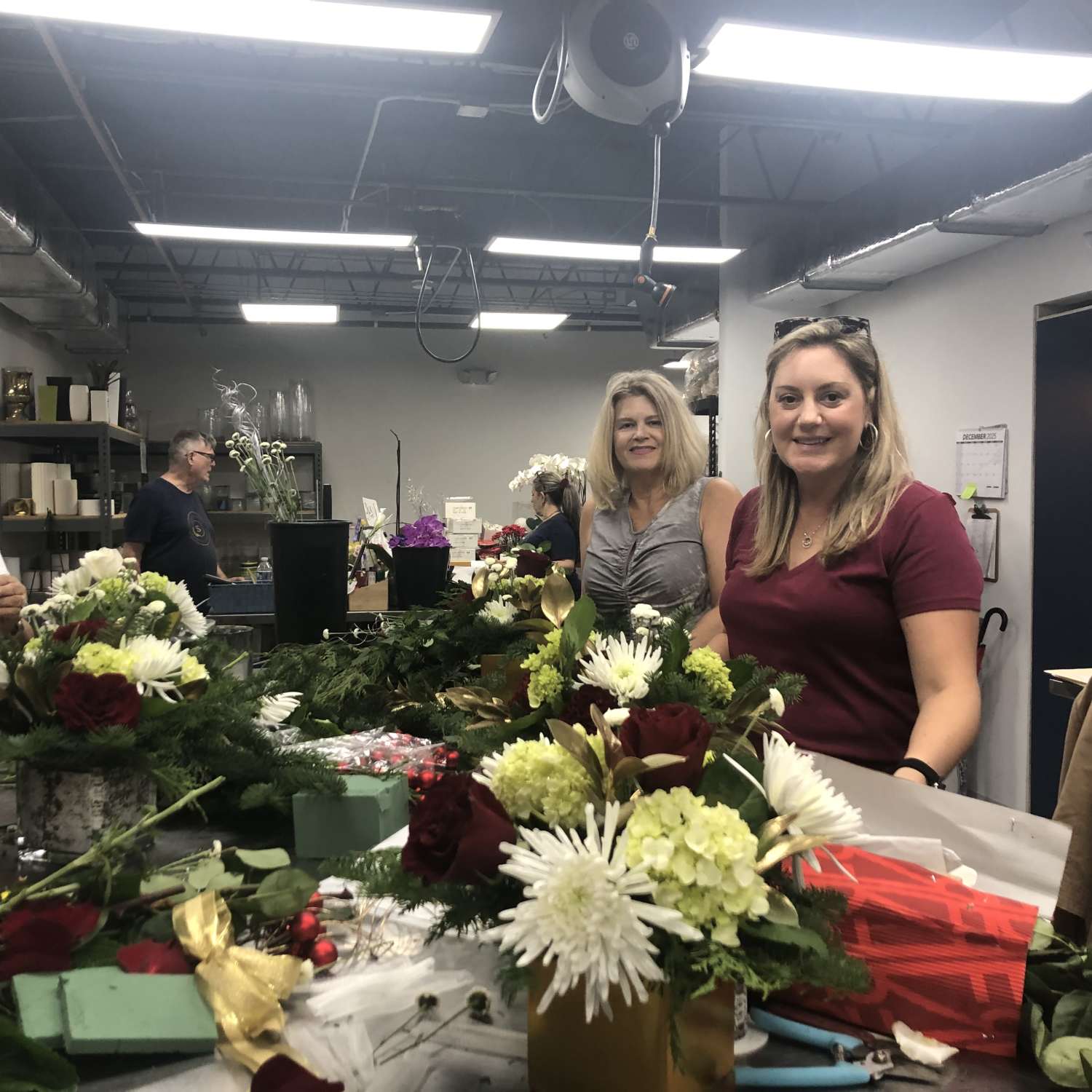 Two women smiling at class