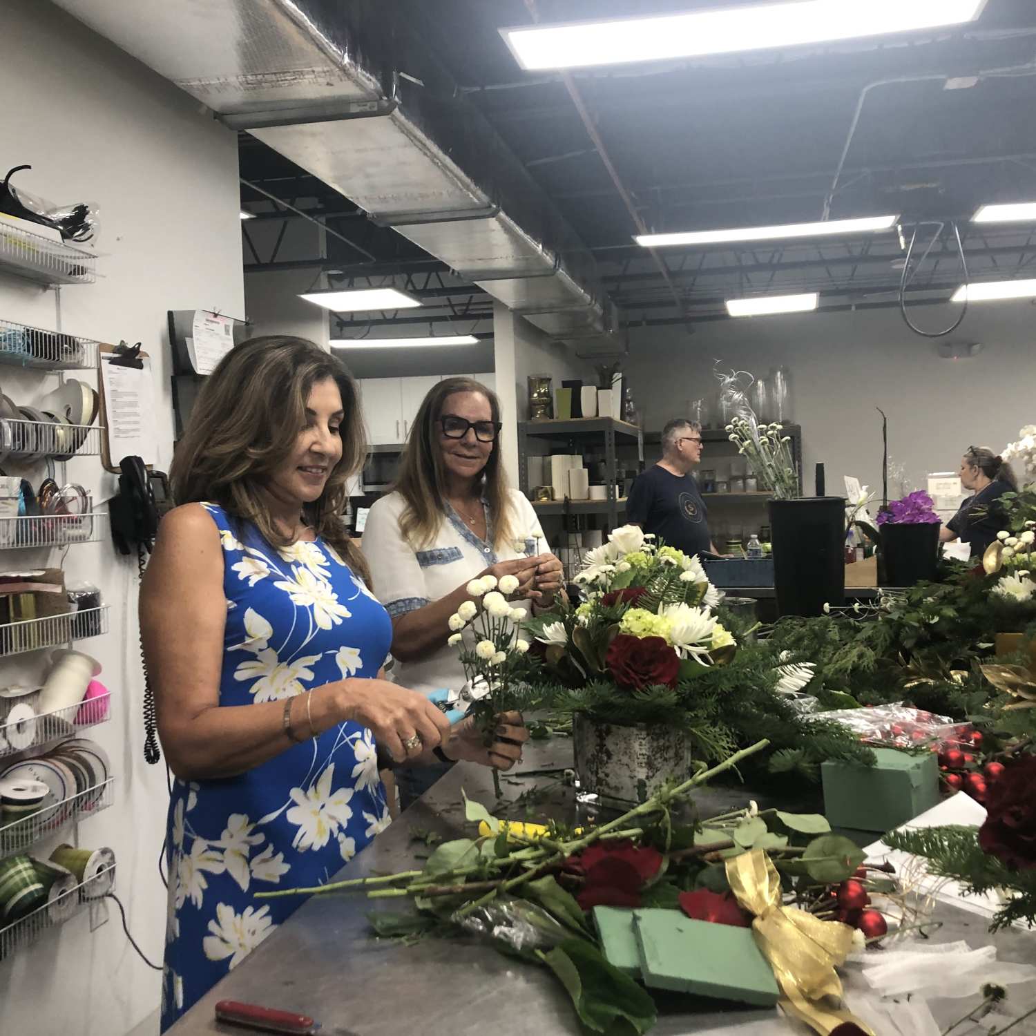 pairs working on flowers