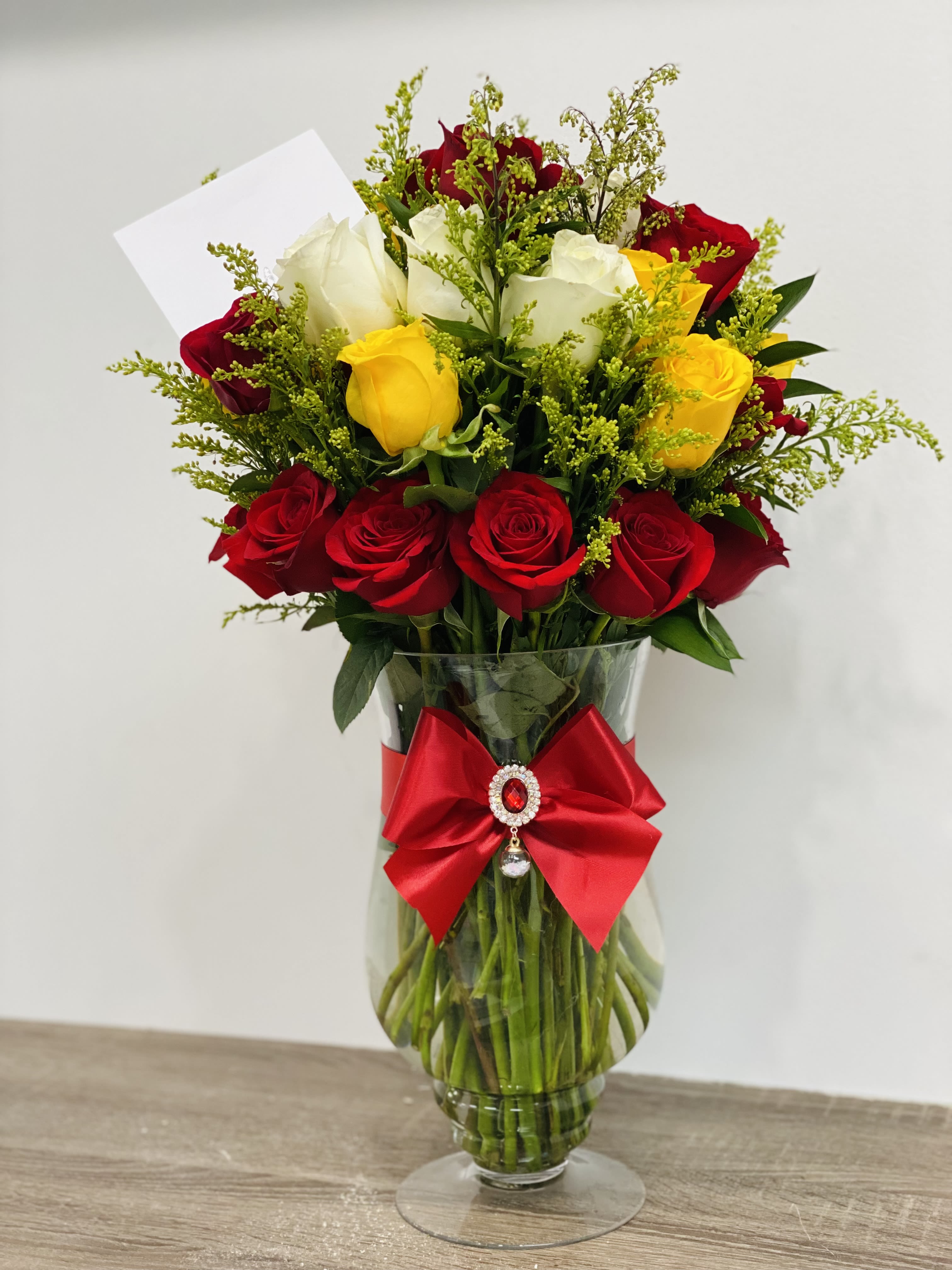 Roses in clear vase 