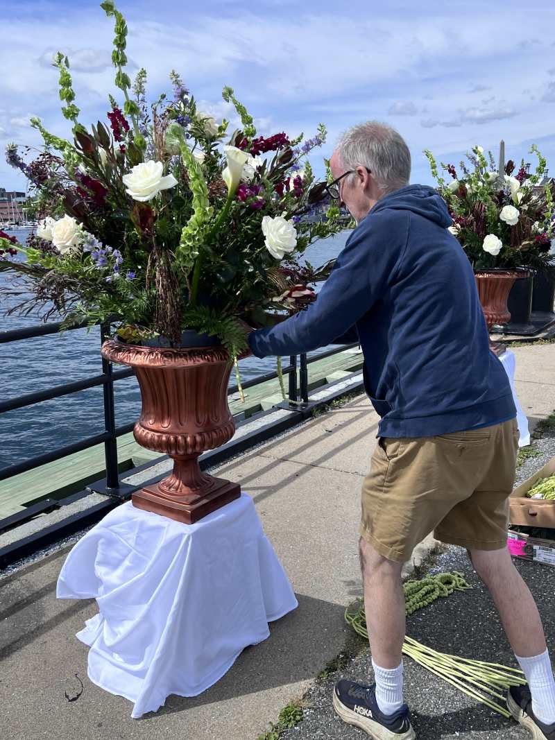 Grand wedding pedestal ceremony flower tall arrangement outside
