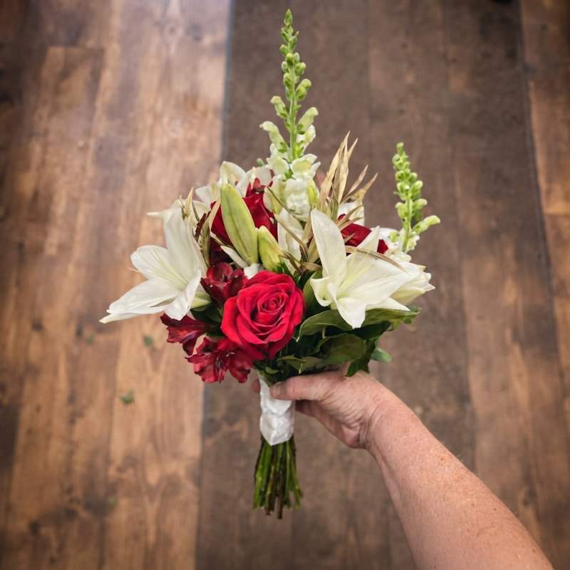 Bride's handheld flower bouquet red white