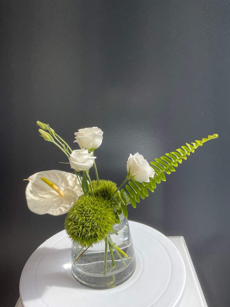 Anthurium, Spray Roses, Trick, and Fern in Glass Cylindrical Vase